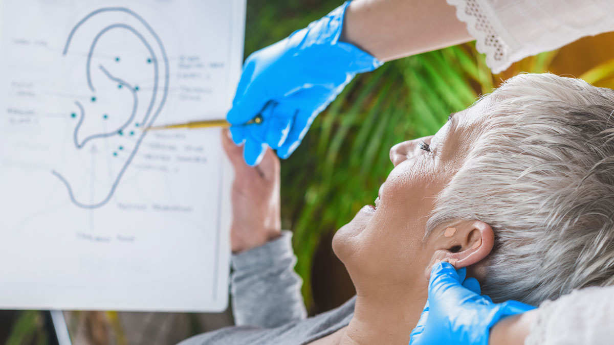 woman learning about ear points